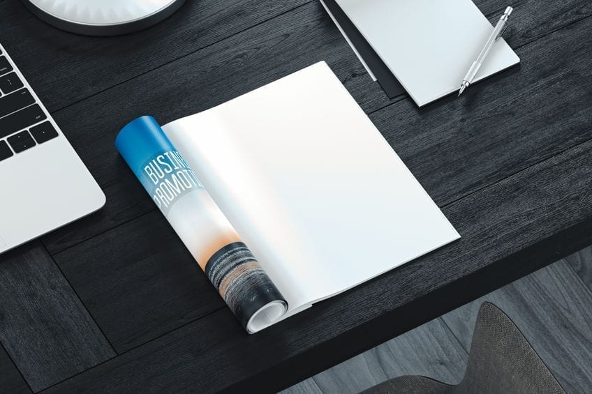 Open magazine with blank pages on gray table. Empty space. 3d rendering. Open magazine with blank pages on gray table. Empty space. 3d rendering.