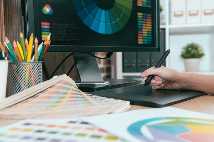 selective focus photo of graphic designer selective focus photo of graphic designer